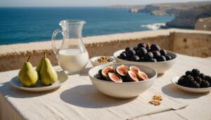 Fibre-rich fruit, yogurt and water on a sunlit limestone terrace table overlooking the Maltese sea